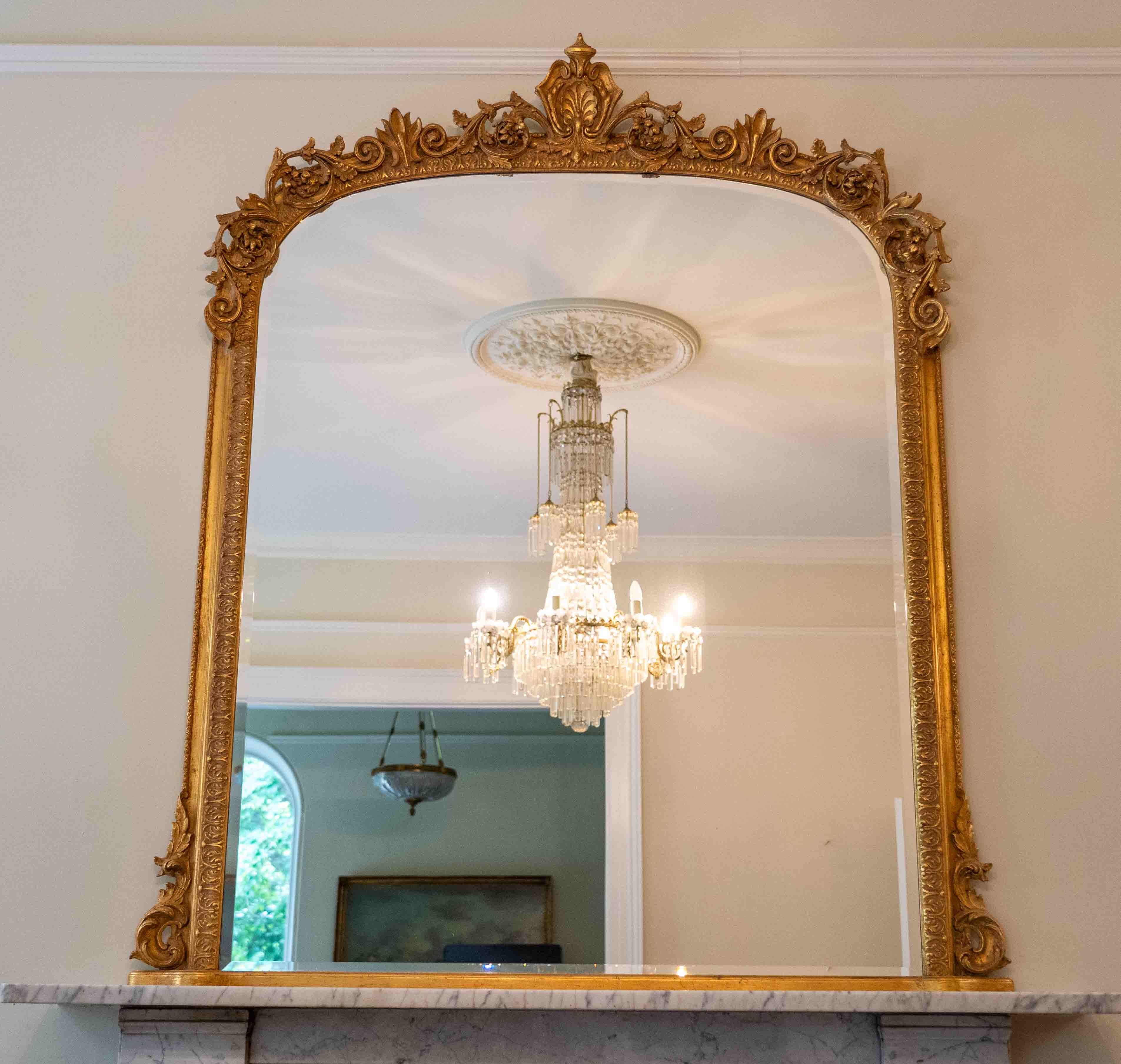 A Victorian style giltwood and composition overmantel mirror, width 138cm, height 180cm. Condition - good